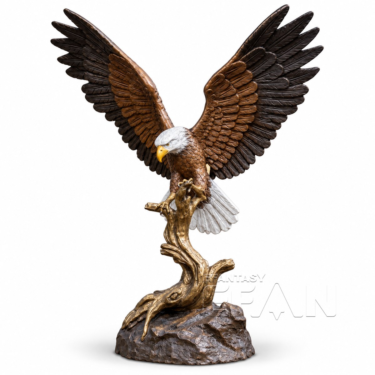 Bronze bald eagle statue with spread wings on a tree and rock base, white background