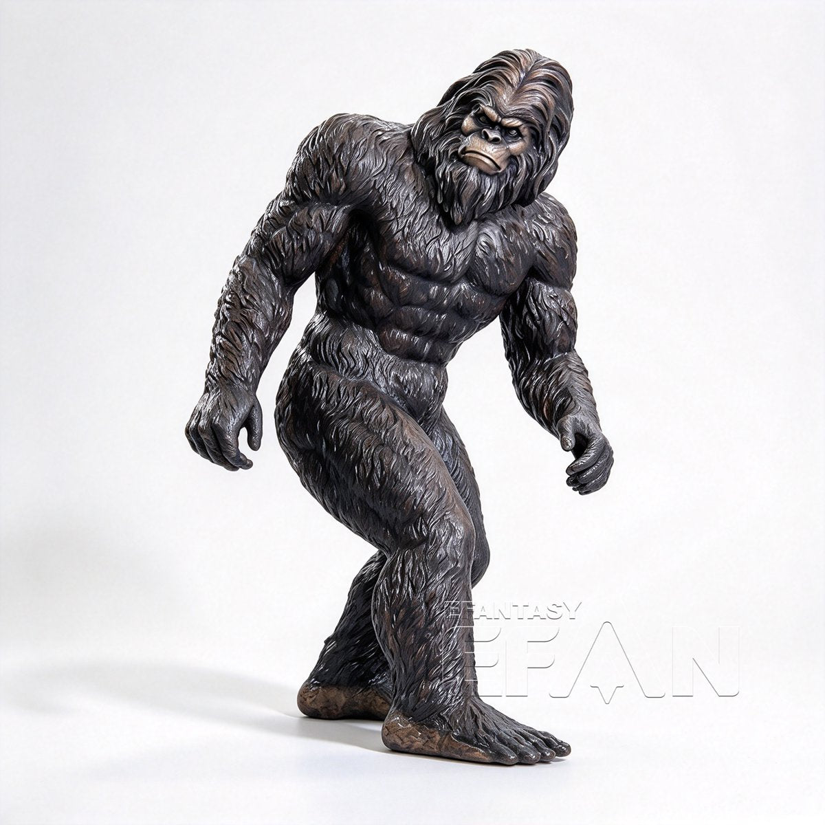 Dark bronze Bigfoot statue with textured fur and walking pose on white background