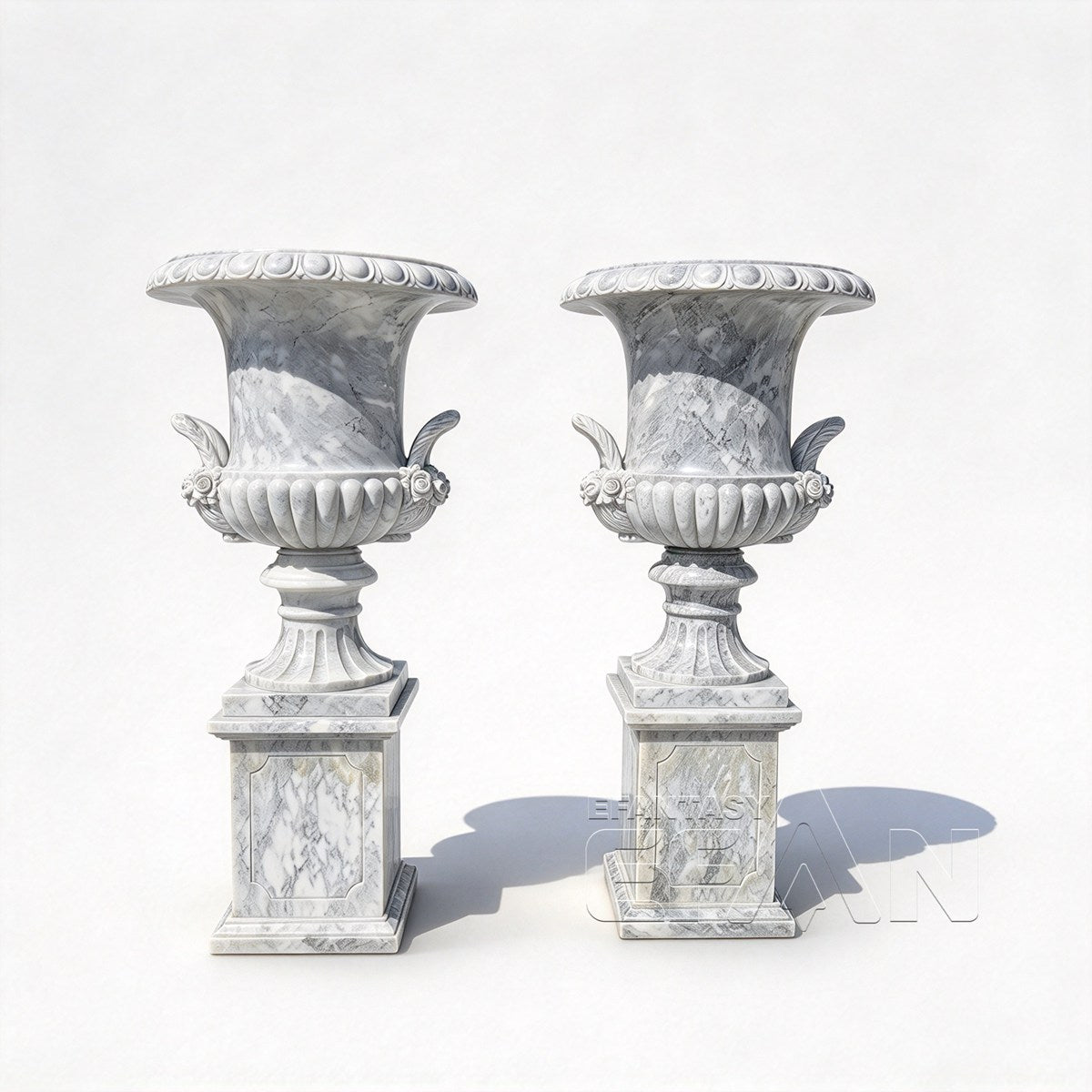 Pair of white and gray marble flower pots with floral handles on a white background