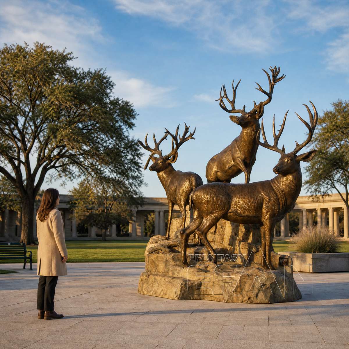 Three bronze elk statues with antique gold finish for mountain resort landscaping